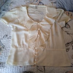 Cream short sleeved ruffle blouse